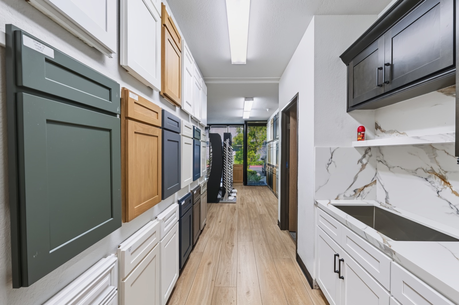 Cabinet displays and countertop vignettes in the San Clemente showroom