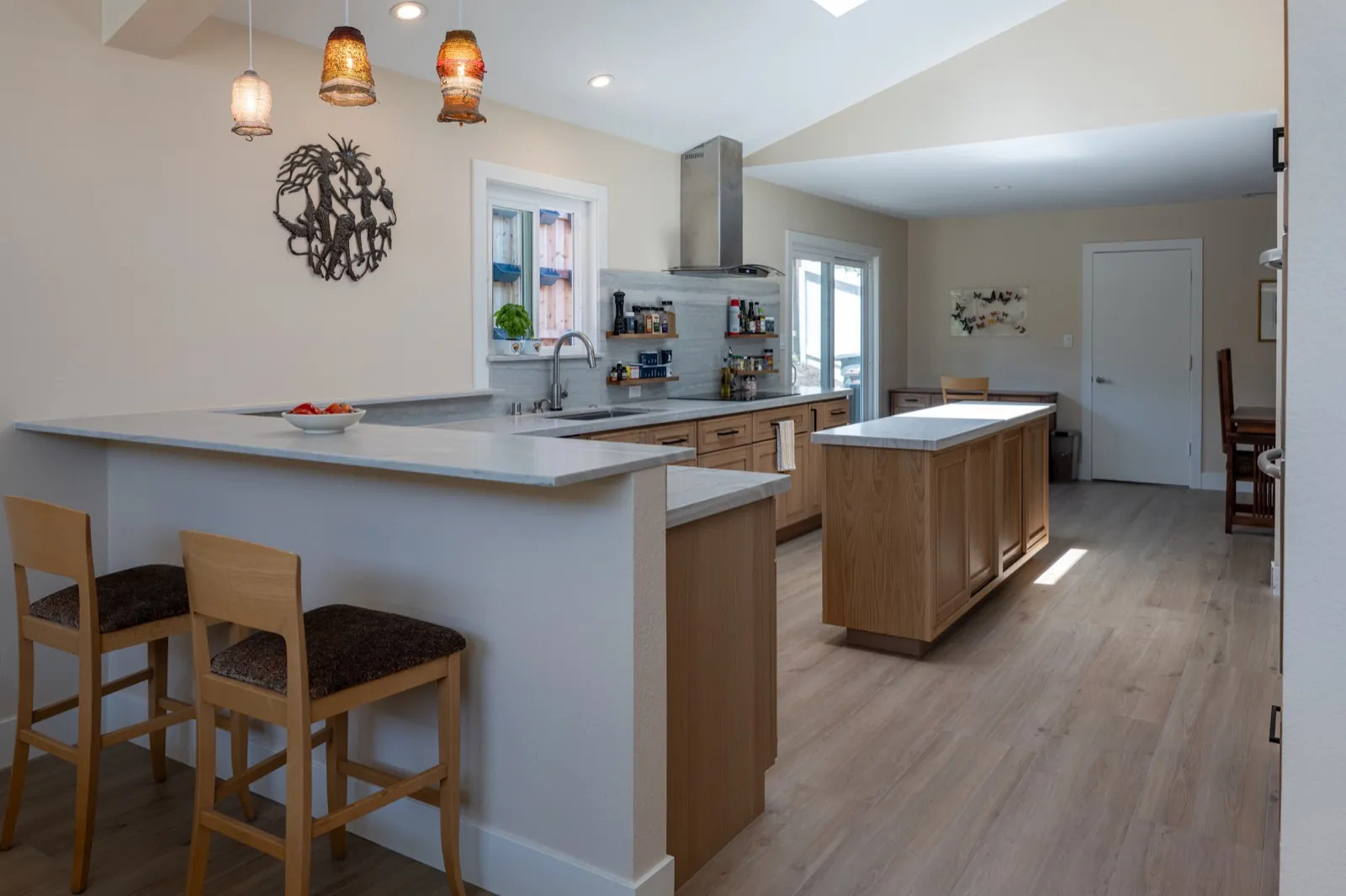 Completed Pacific Stone kitchen project illustrating Full-Height Backsplash: What to Plan Before Fabrication