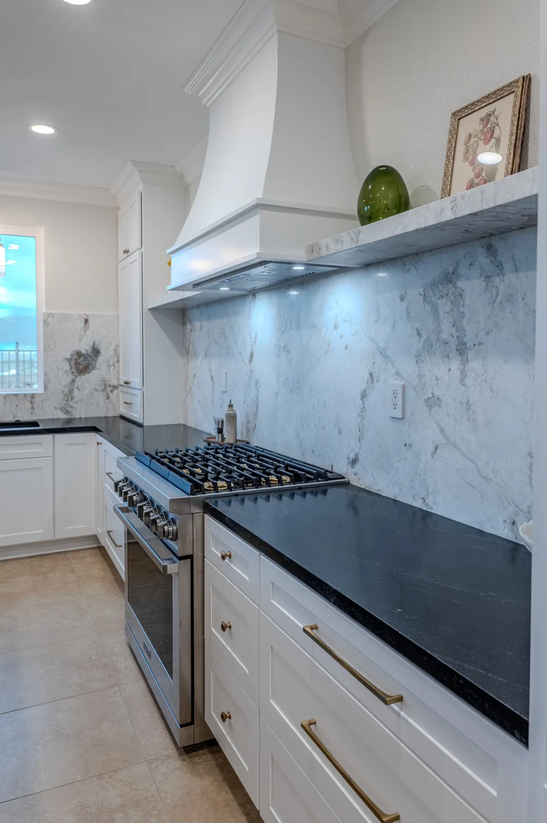 Full-height stone backsplash