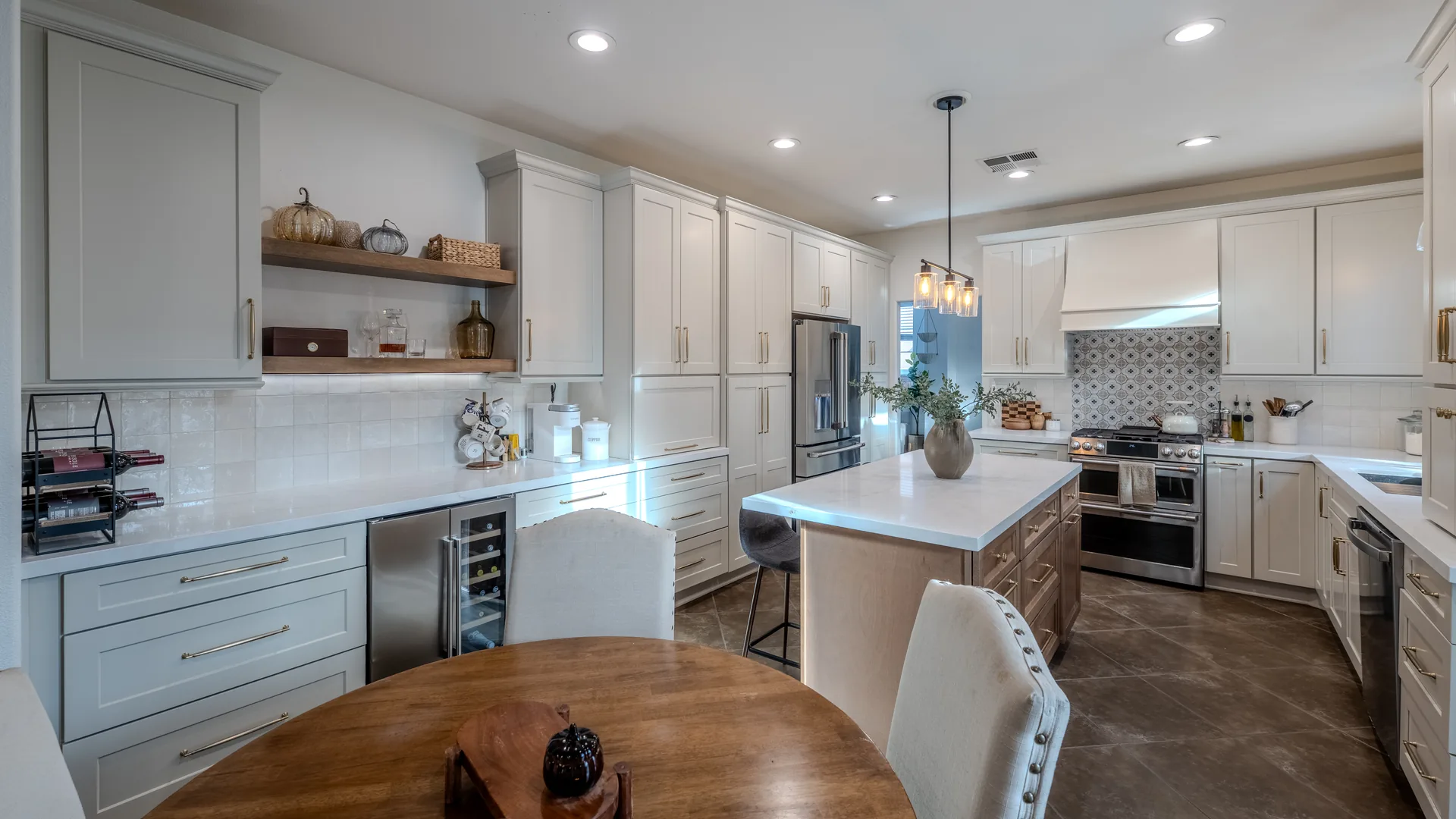 Finished Pacific Stone kitchen with custom cabinetry and integrated storage