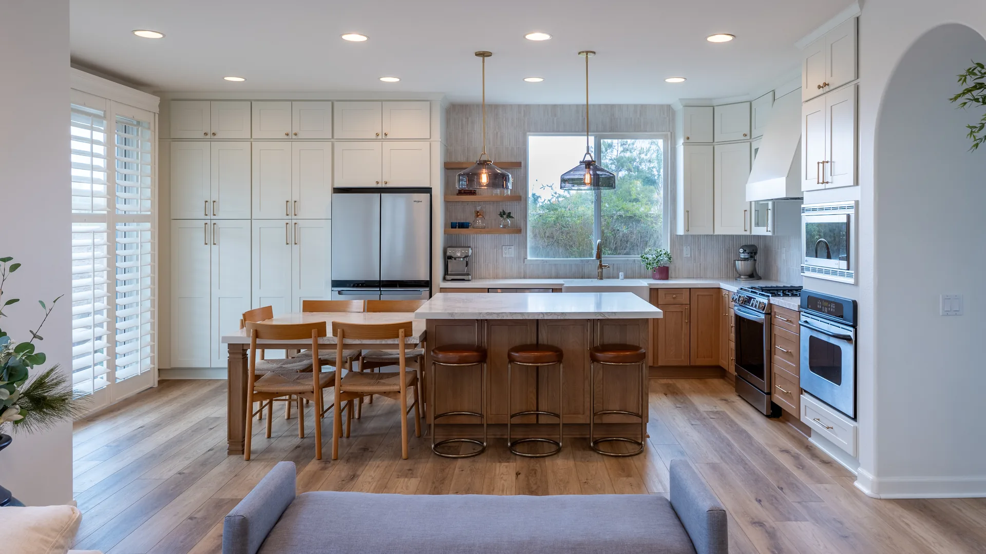 Finished Pacific Stone kitchen with coordinated cabinetry, countertops, and backsplash