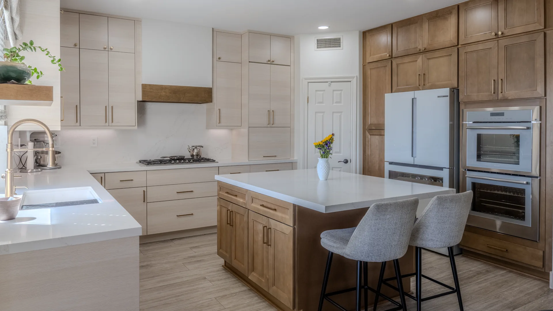Finished Pacific Stone kitchen with custom cabinetry and integrated storage