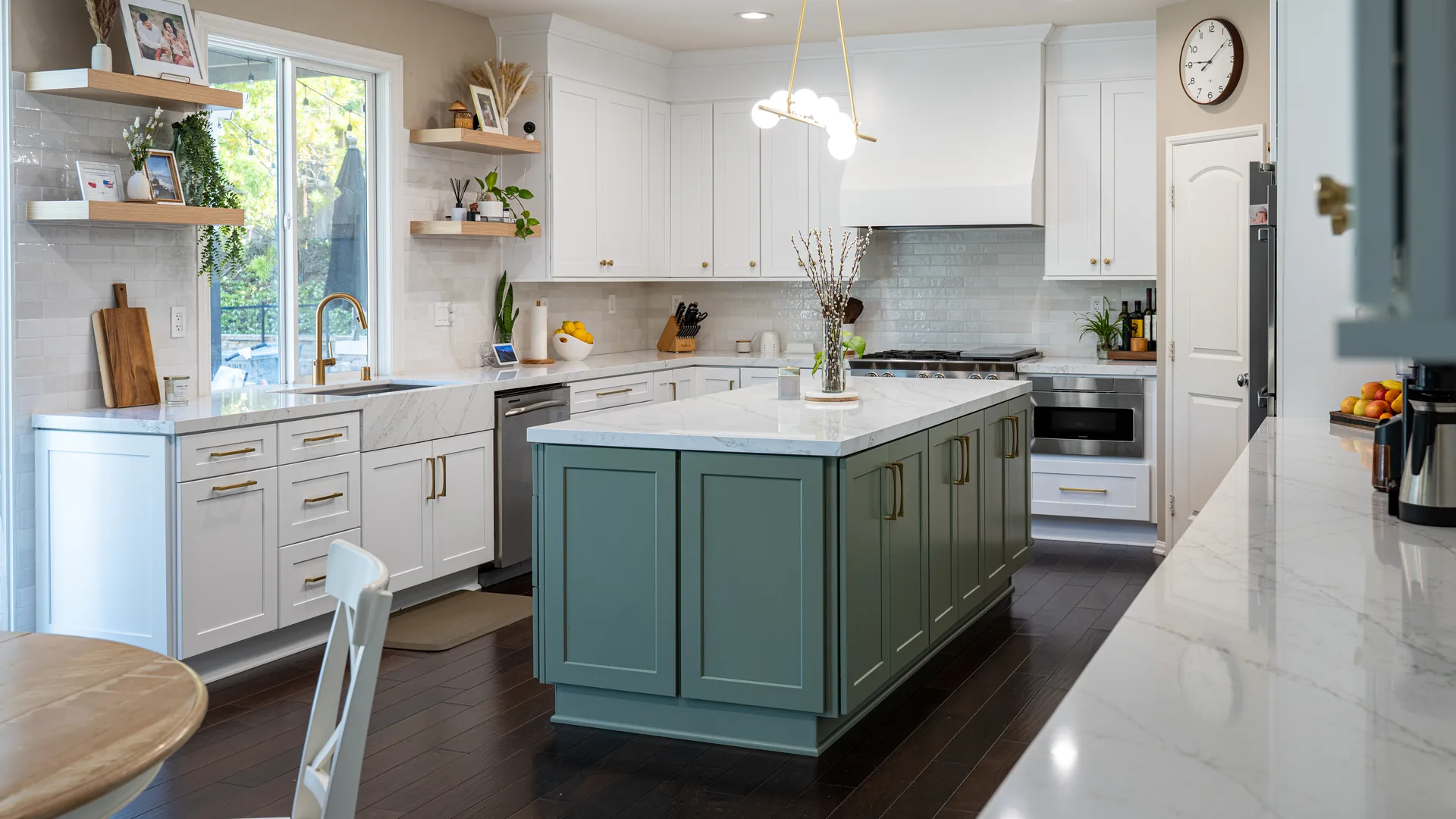 Finished Pacific Stone kitchen with coordinated cabinetry, countertops, and backsplash