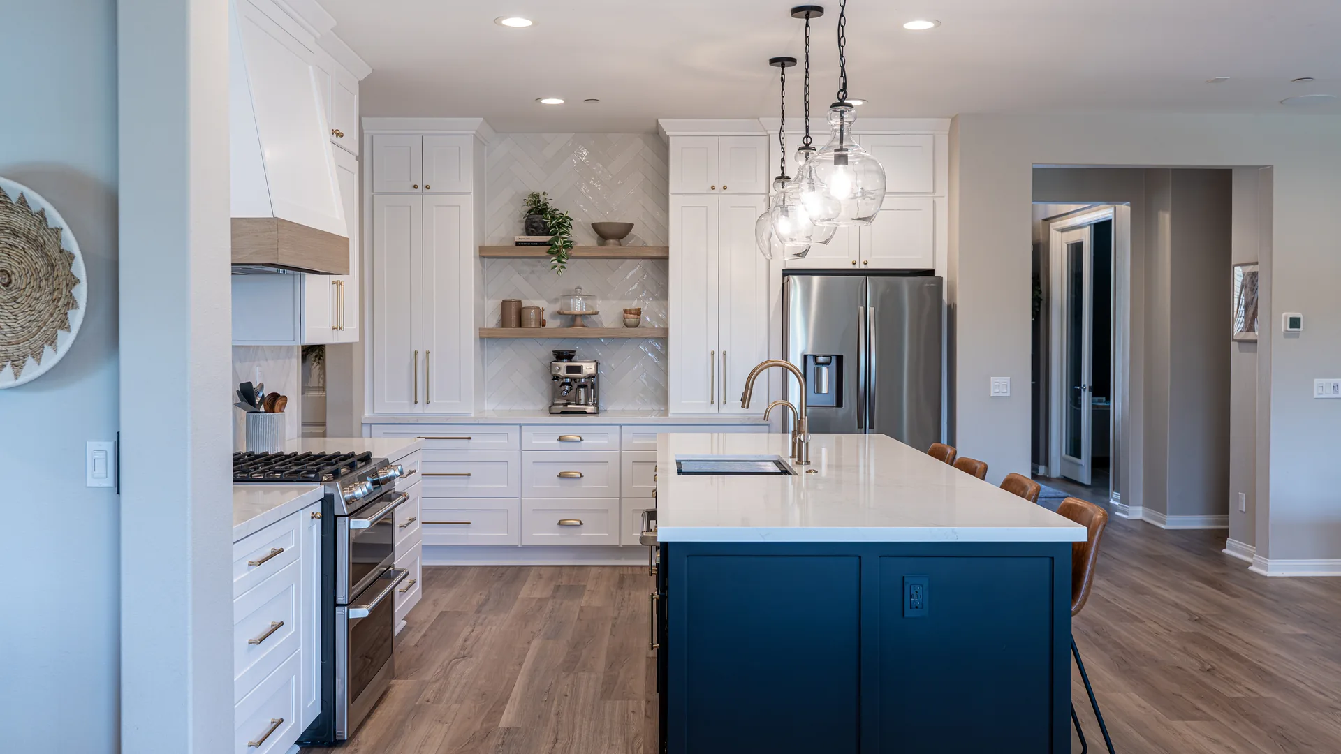 Finished Pacific Stone kitchen with stone countertops and a full-height backsplash