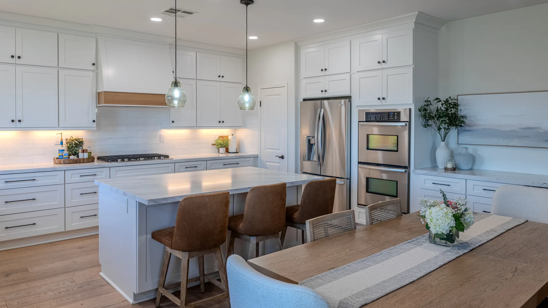Finished Pacific Stone kitchen with custom cabinetry and integrated storage