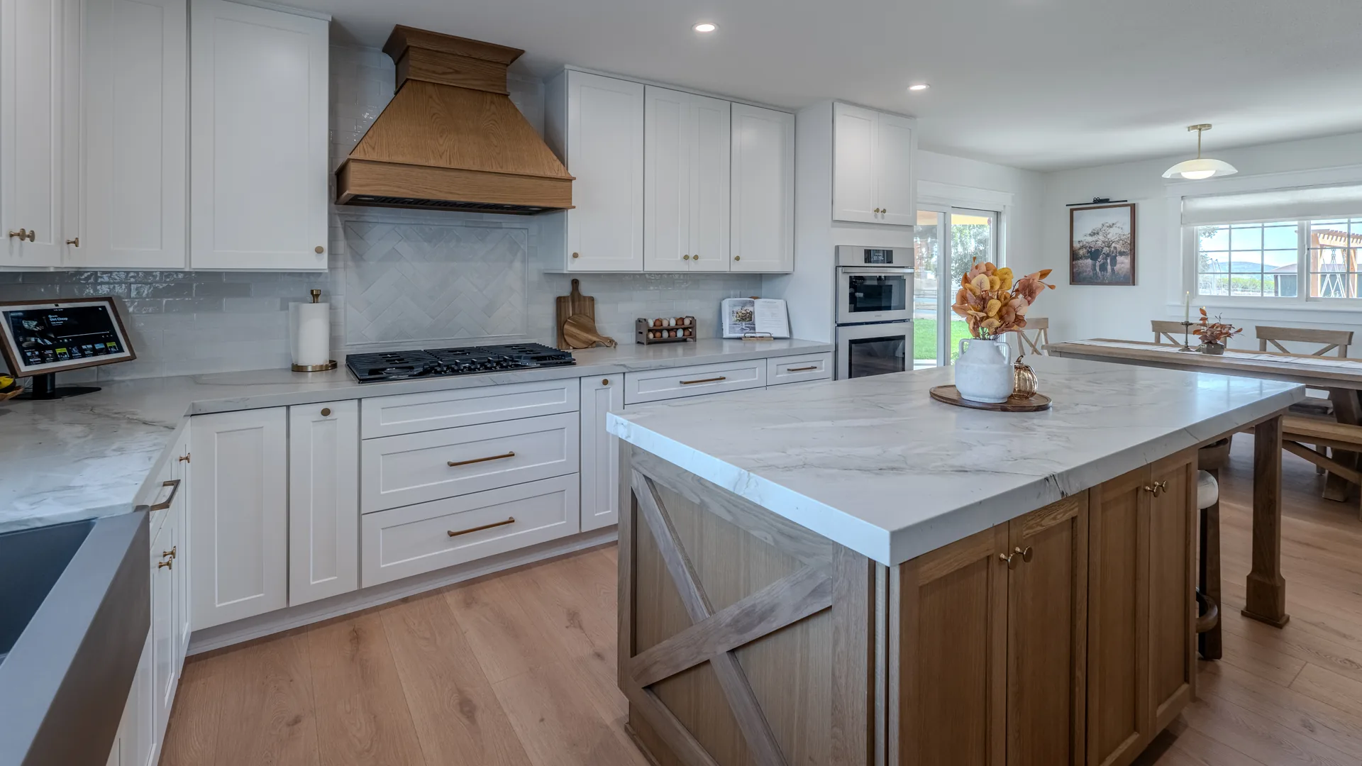 Finished Pacific Stone kitchen with coordinated cabinetry, countertops, and backsplash