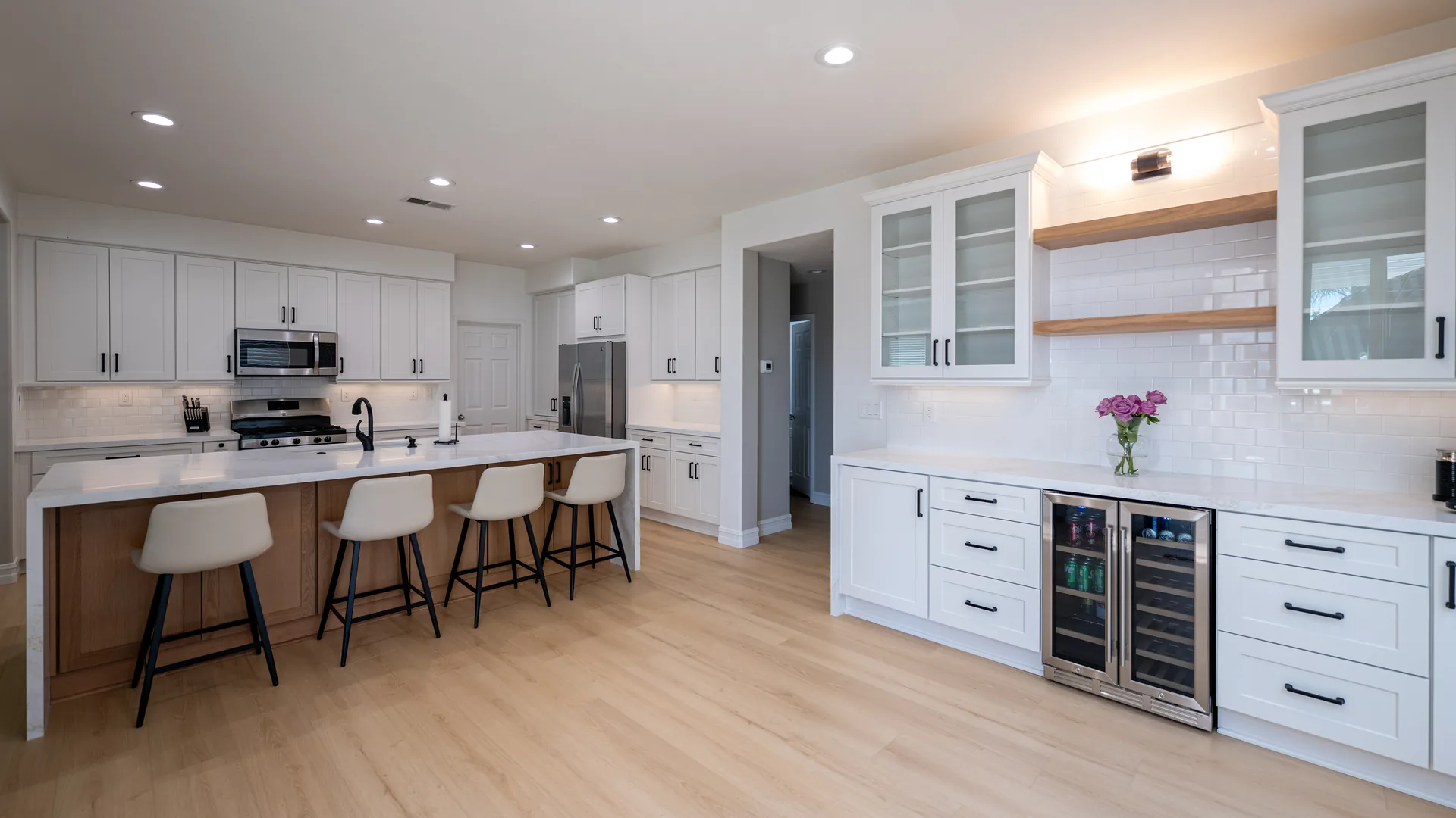 Finished Pacific Stone kitchen with coordinated cabinetry, countertops, and backsplash