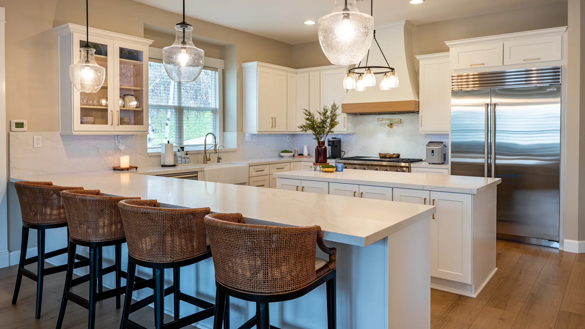 Finished Pacific Stone kitchen with coordinated cabinetry, countertops, and backsplash