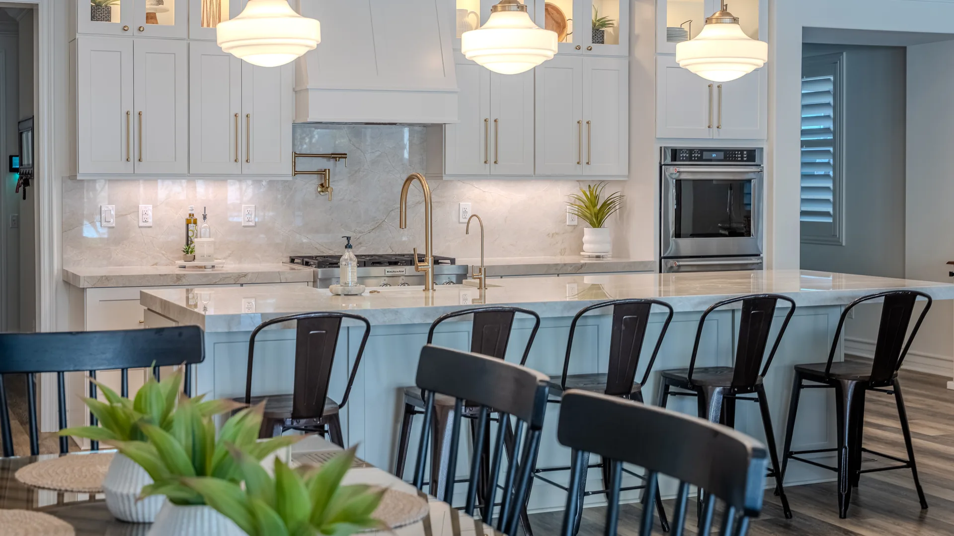 Finished Pacific Stone kitchen with coordinated cabinetry, countertops, and backsplash