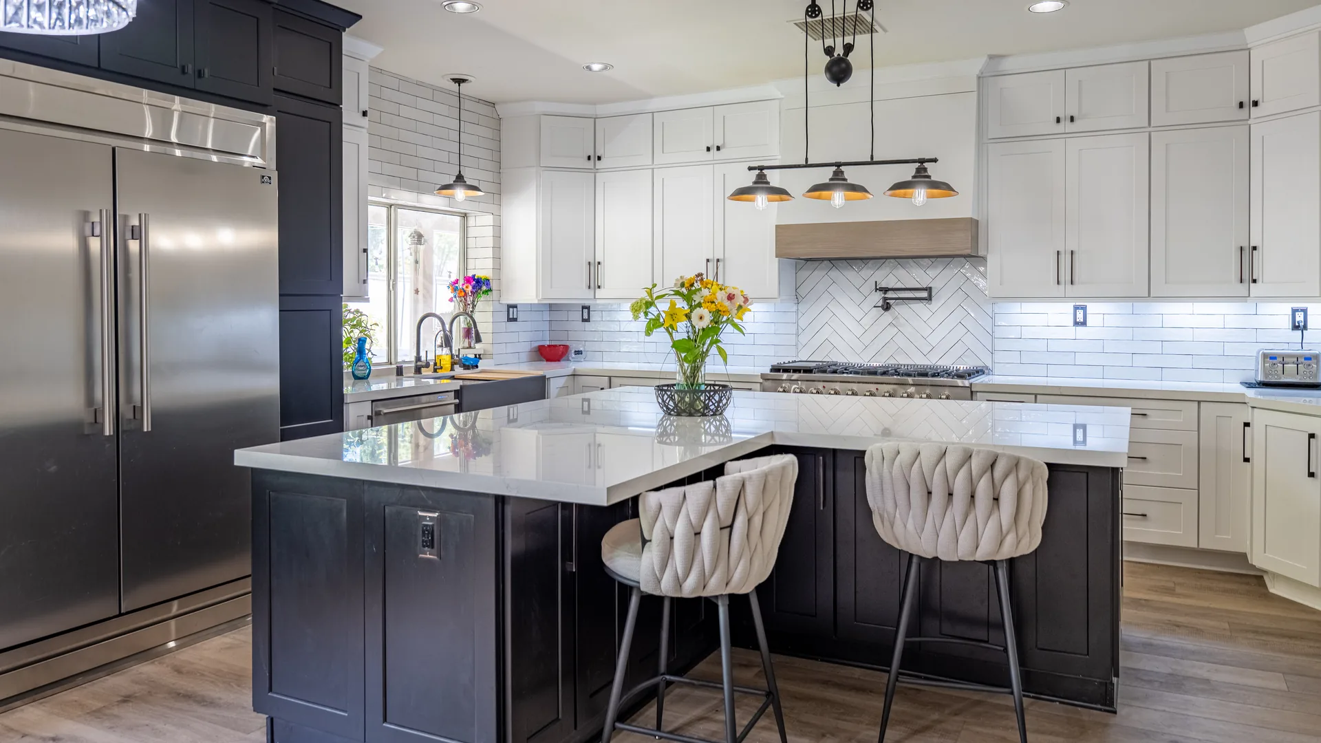 Finished Pacific Stone kitchen with stone countertops and a full-height backsplash