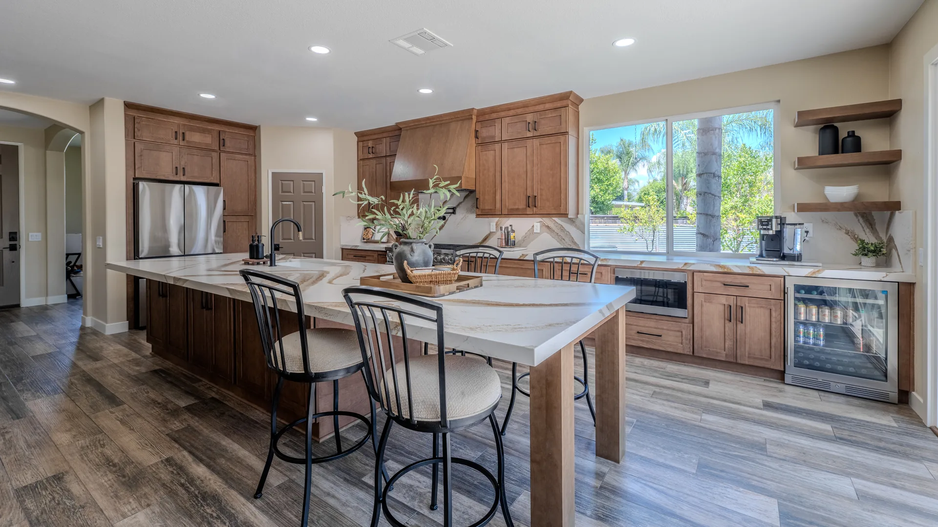 Finished Pacific Stone kitchen with custom cabinetry and integrated storage