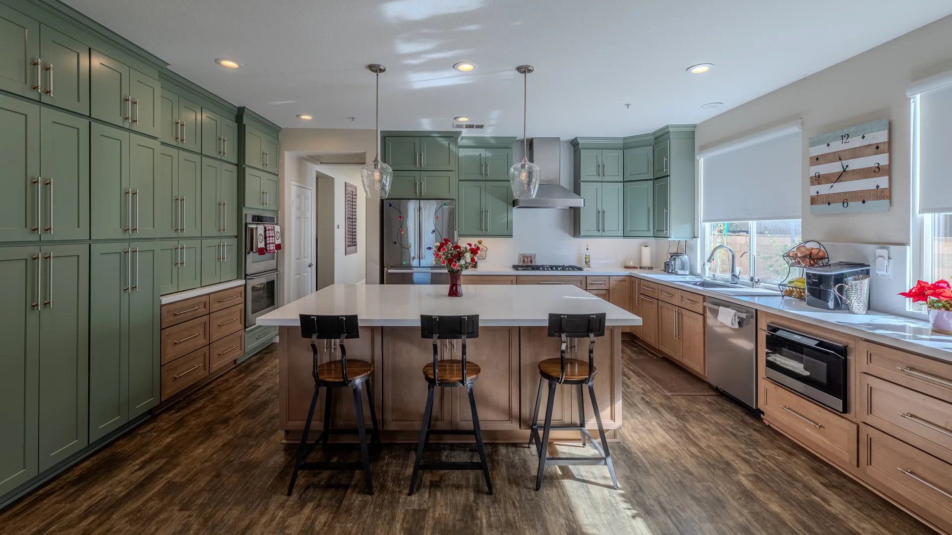 Finished Pacific Stone kitchen with coordinated cabinetry, countertops, and backsplash