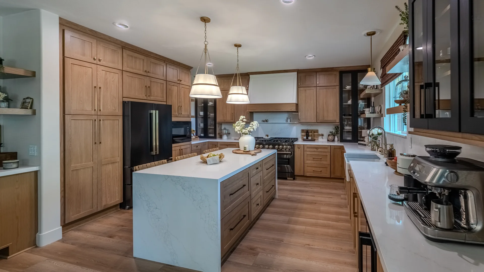 Finished Pacific Stone kitchen with coordinated cabinets and stone surfaces