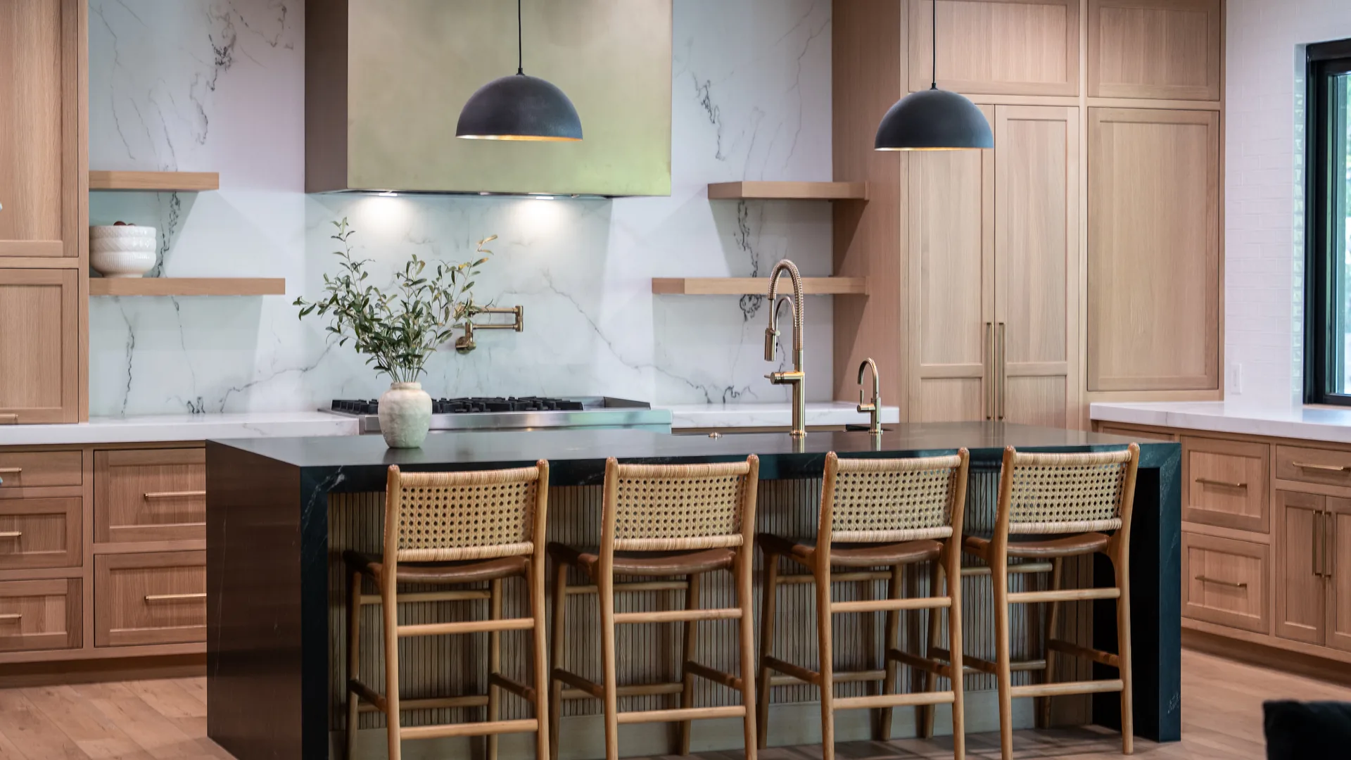 Finished Pacific Stone kitchen with custom cabinetry and integrated storage