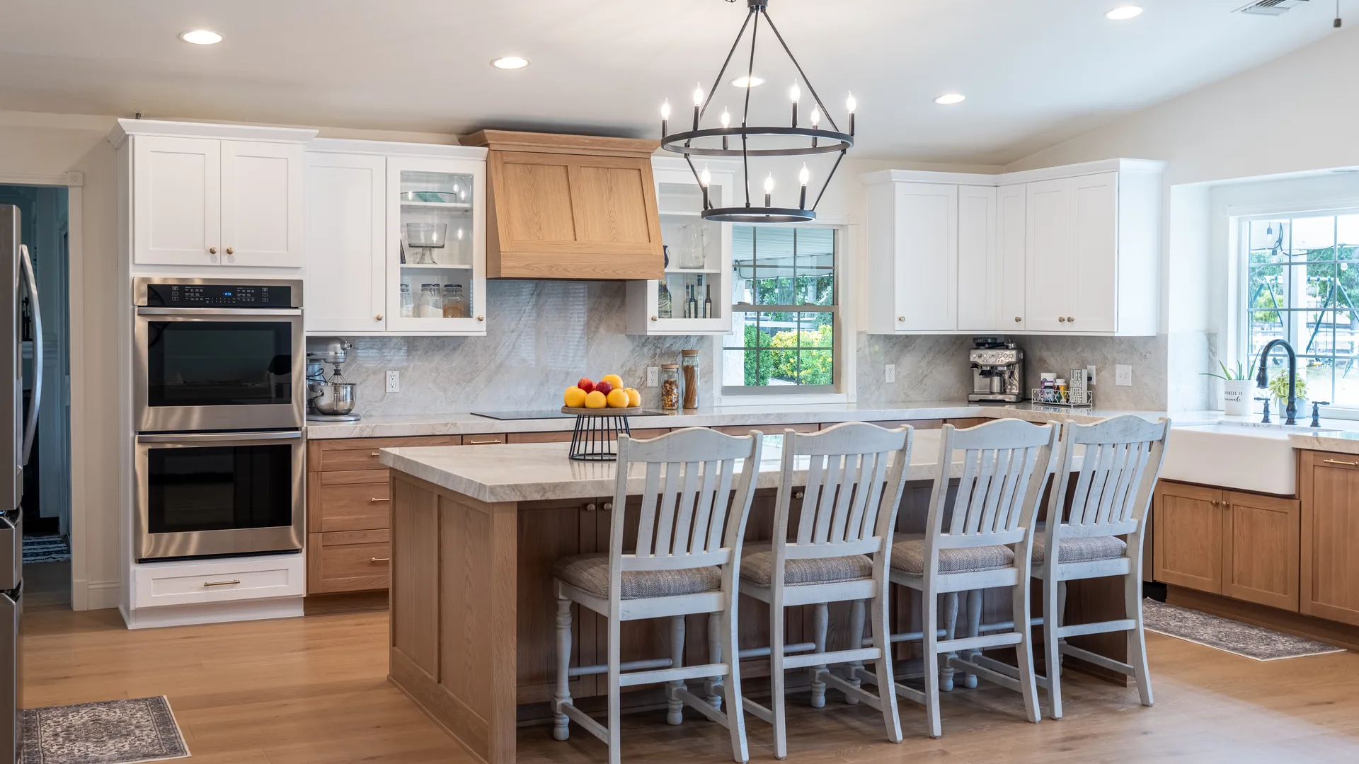 Finished Pacific Stone kitchen with coordinated cabinetry, countertops, and backsplash