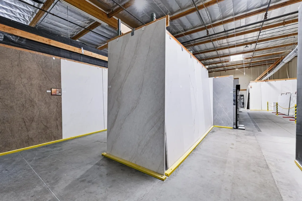 Wide view of manufactured countertop slabs inside the Temecula showroom